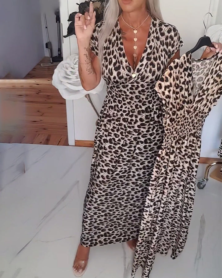 Elegant dress with leopard print and V-neck.